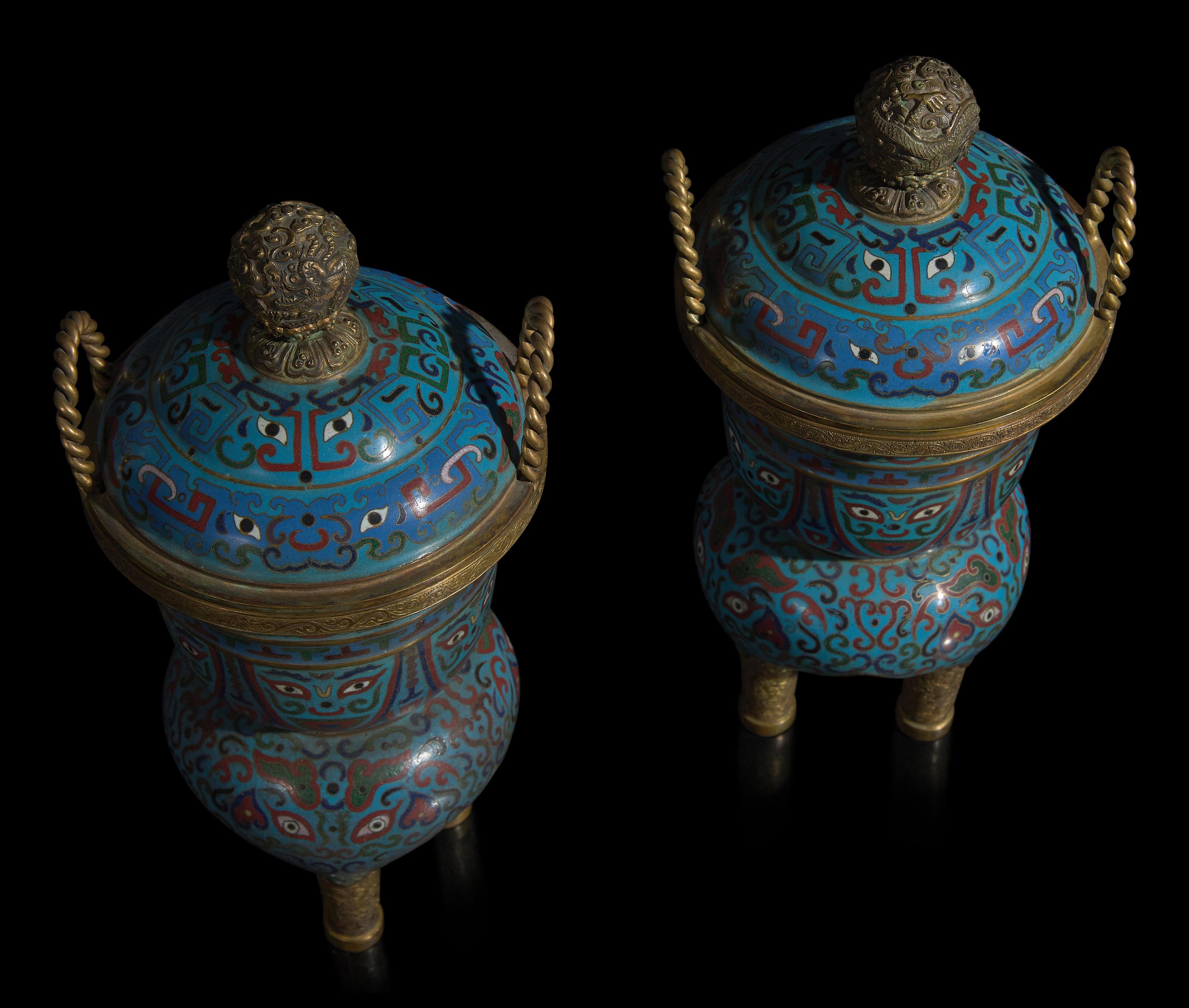 A Pair of Chinese Cloisonné Covered Tripod Vessels, 20th Century 近代 掐絲琺瑯仿古三足爐一對
