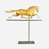 A patinated gilded copper weathervane of a running horse