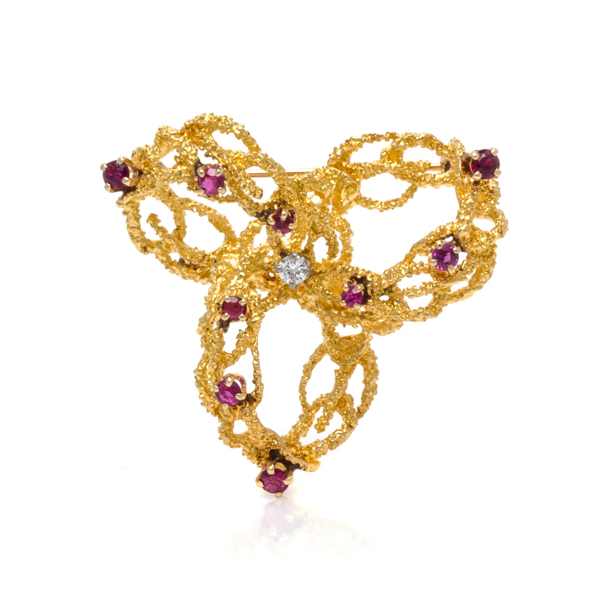 An 18 Karat Yellow Gold, Ruby and Diamond Brooch, Tiffany & Co., Circa 1960, 9.70 dwts.