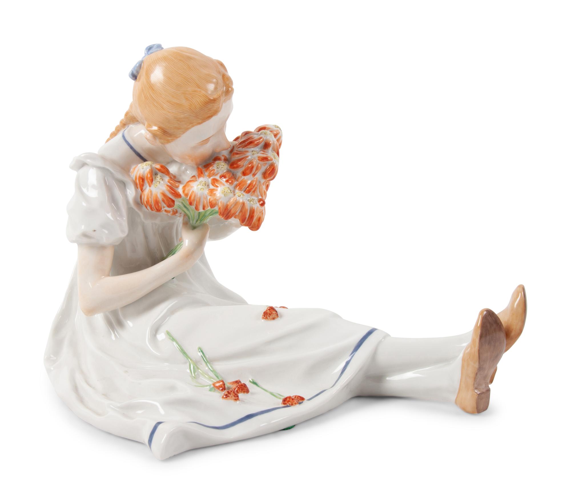 A Meissen Porcelain Figure of a Seated Girl with Flowers by Konrad Hentschel