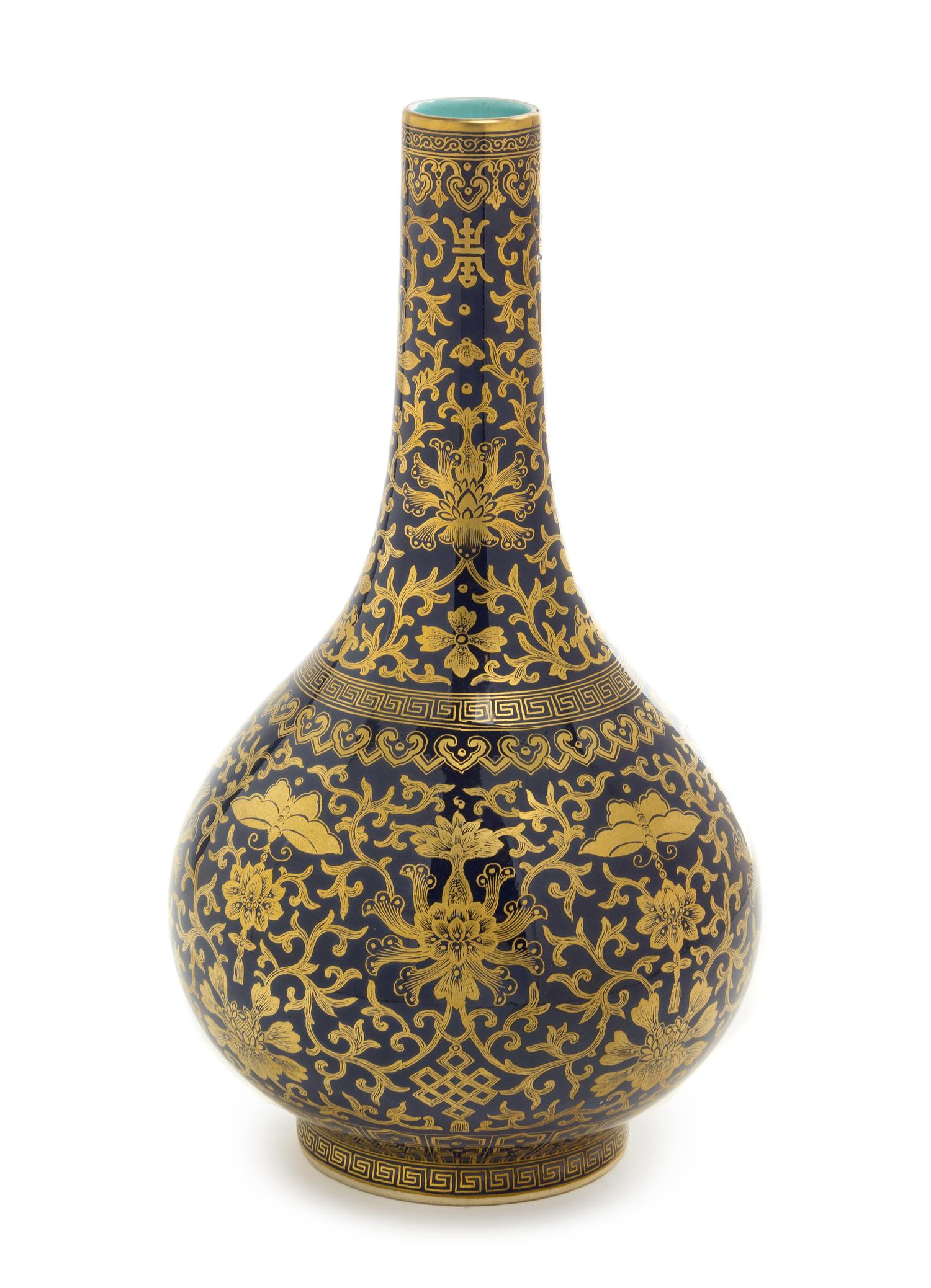 A Gilt Decorated Blue Glazed Porcelain Bottle Vase Height 12 1/2 inches.