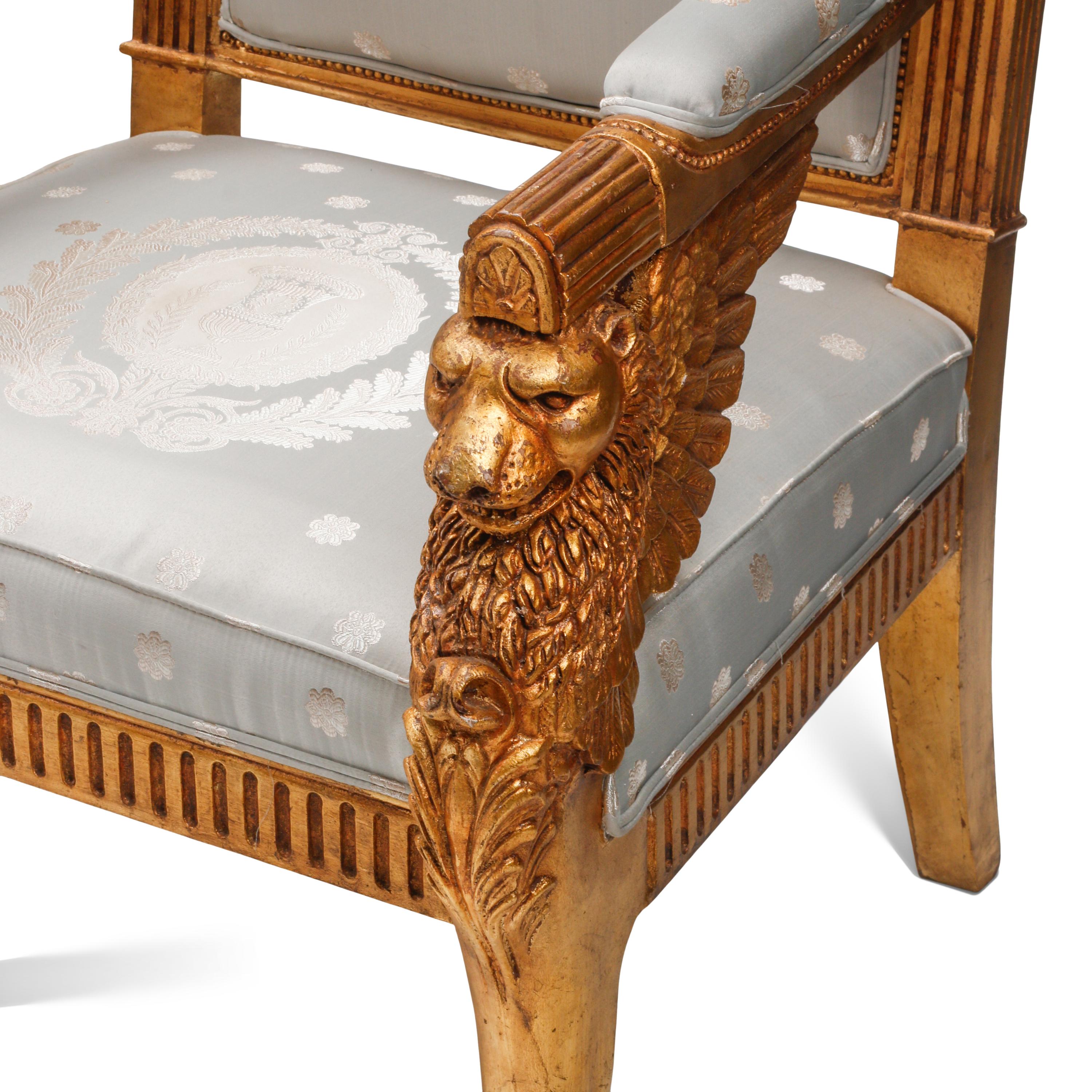An Italian Neoclassical Style Carved Three-Piece Seating Suite