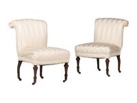 A Pair of Victorian Mahogany Roll Back Slipper Chairs