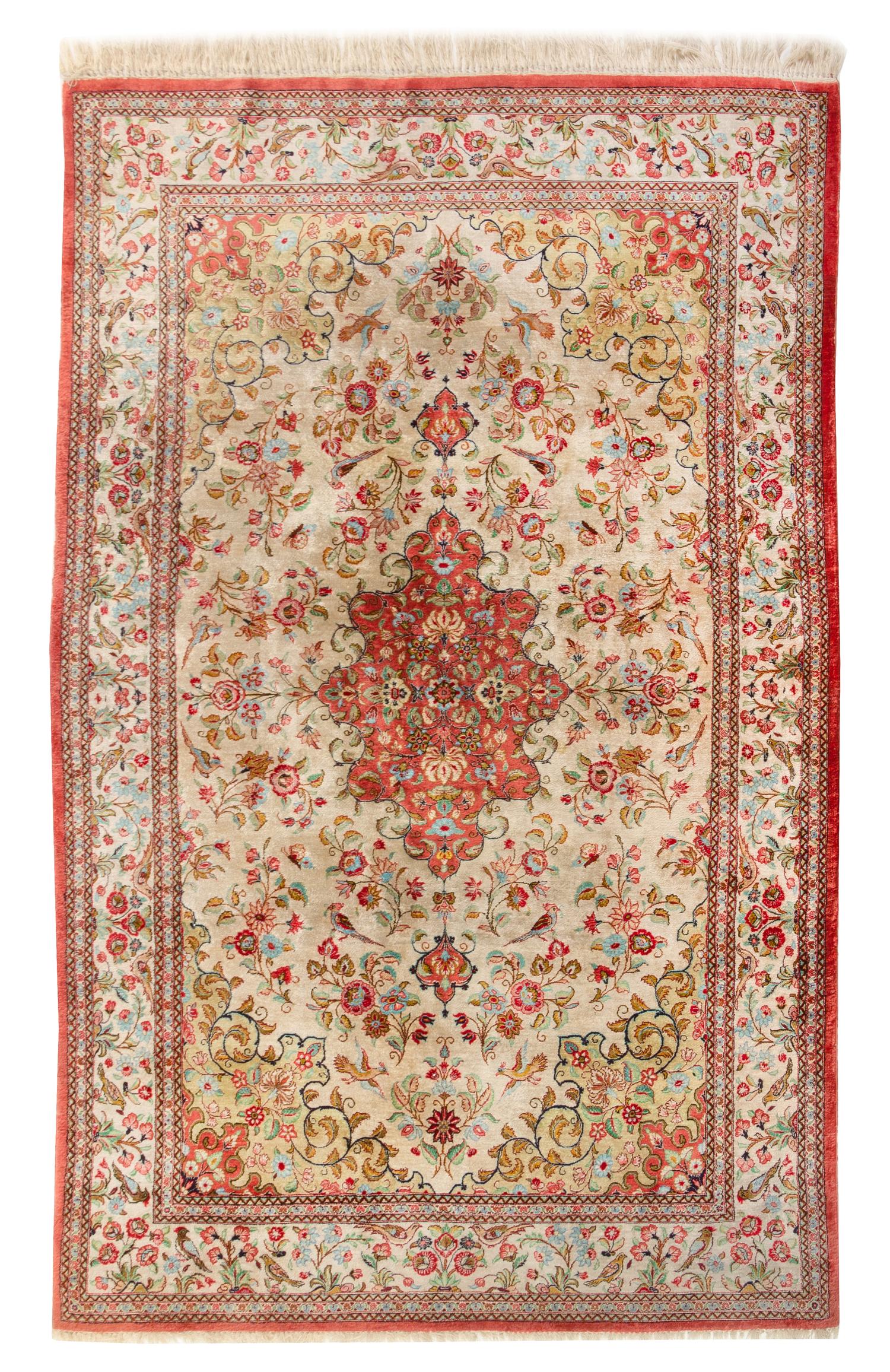 A Persian Silk Rug 6 feet 9 inches x 4 feet 3 inches. — 20TH CENTURY