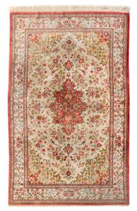 A Persian Silk Rug 6 feet 9 inches x 4 feet 3 inches. — 20TH CENTURY