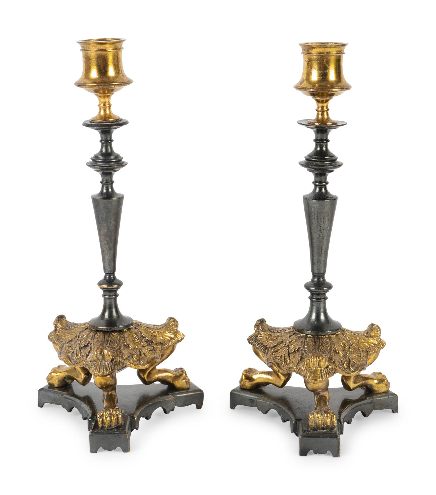 A Pair of French Empire Style Brass and Steel Candlesticks