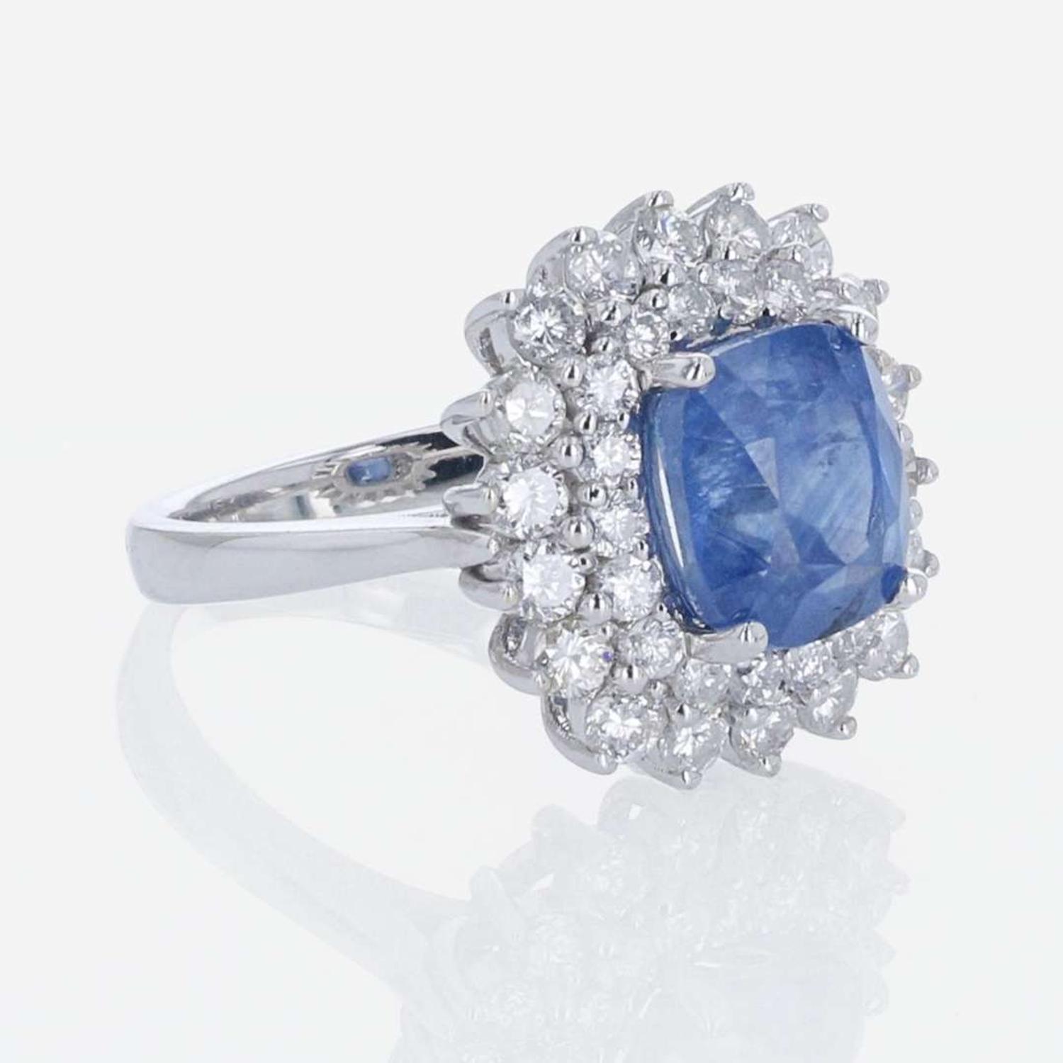A Sapphire, Diamond, and 18K White Gold Ring
