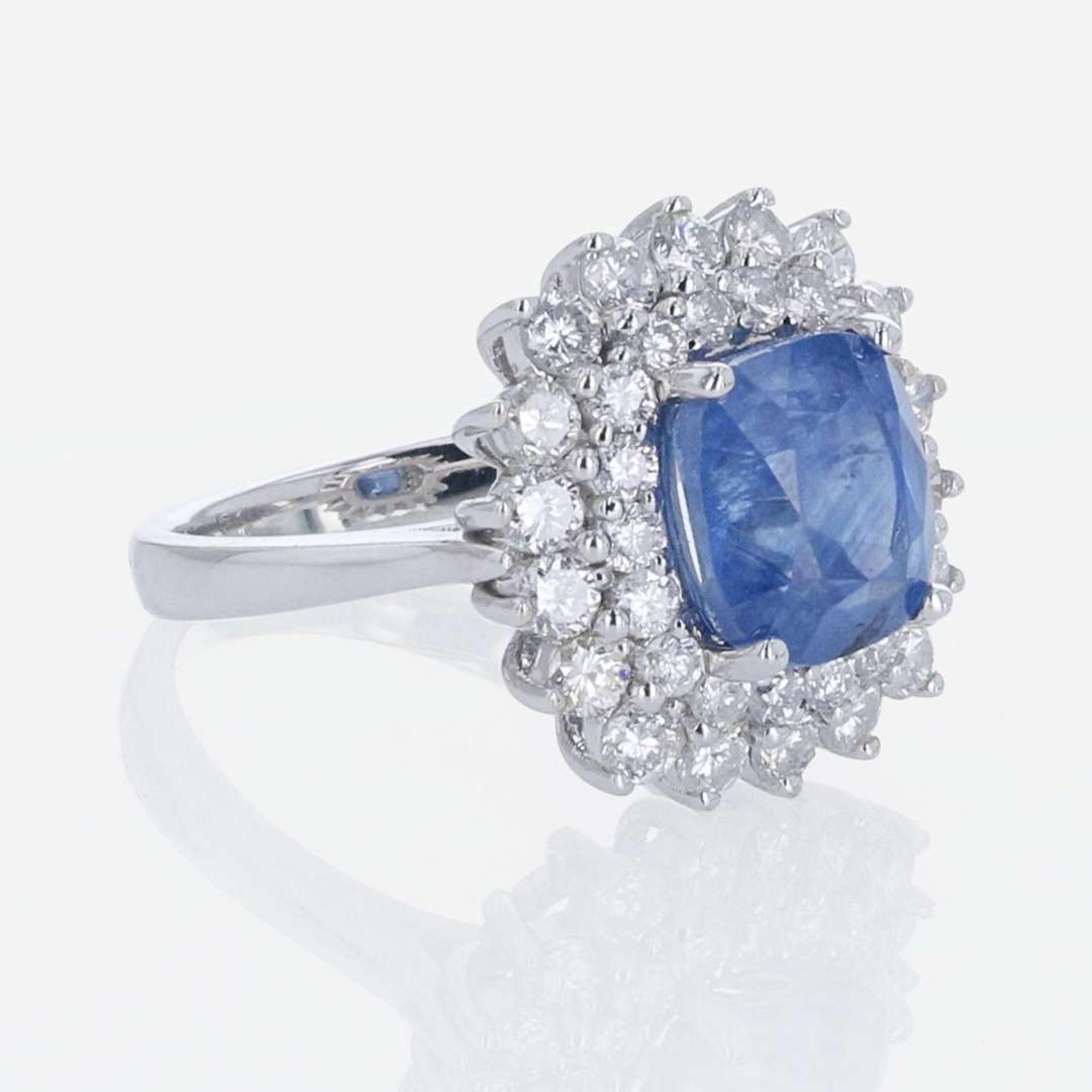A Sapphire, Diamond, and 18K White Gold Ring