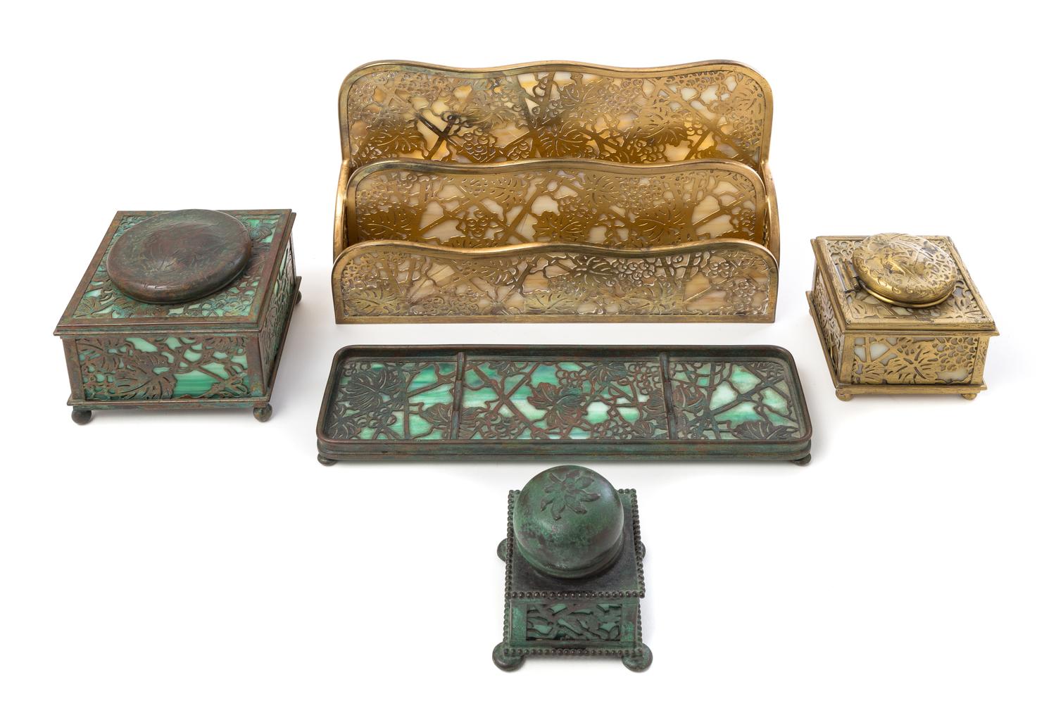 Tiffany Studios, a set of four Grapevine pattern desk articles, with an associated small covered inkwell