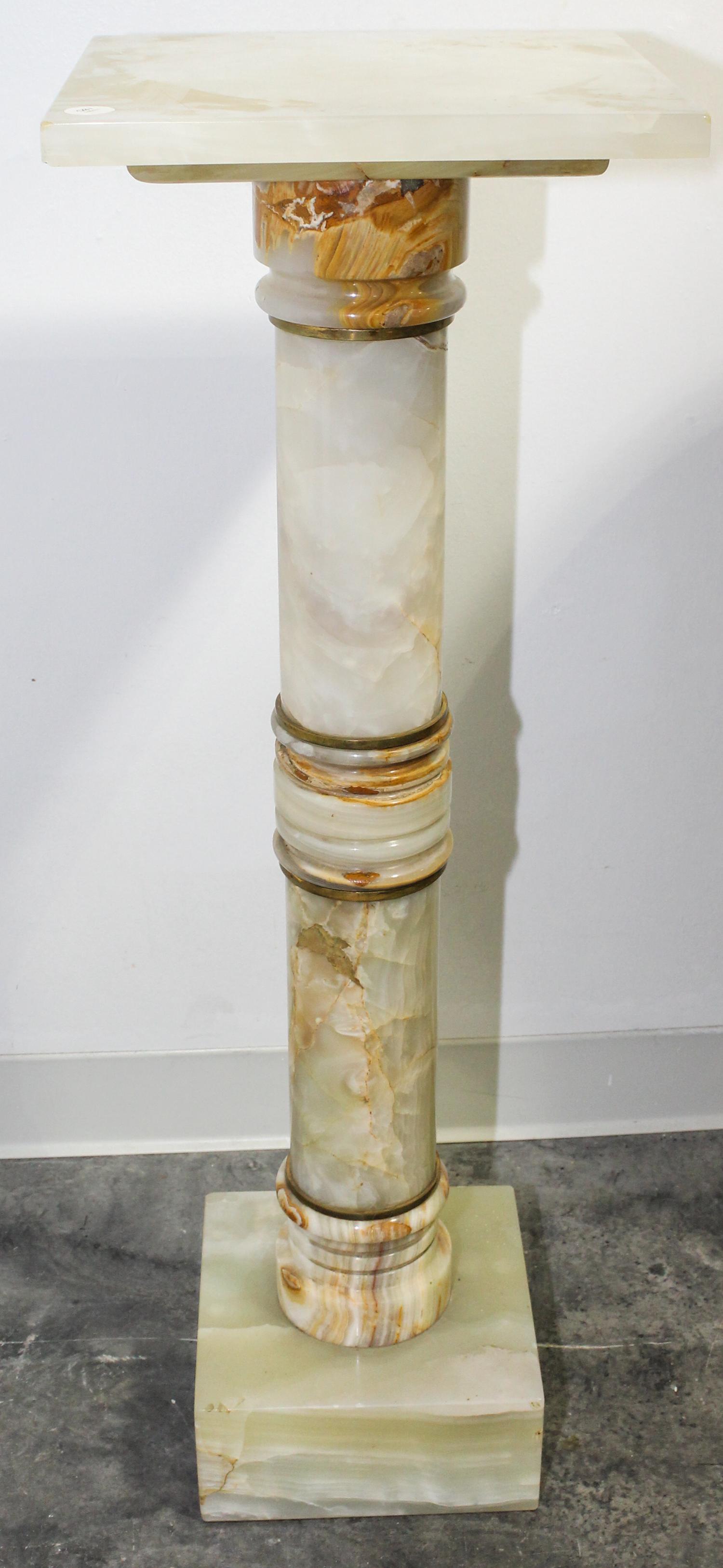 A Continental Onyx Pedestal. Height 38 inches.