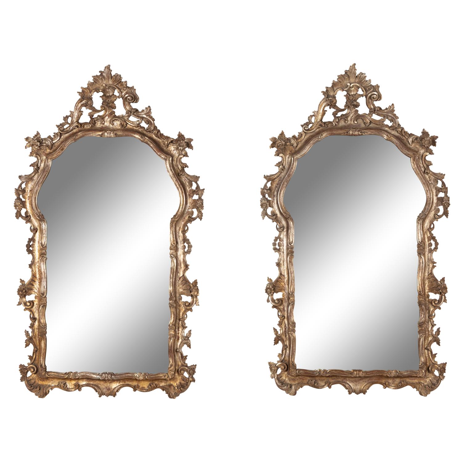 A Pair of Italian Baroque Style Silvered Wood Mirrors