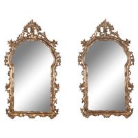 A Pair of Italian Baroque Style Silvered Wood Mirrors
