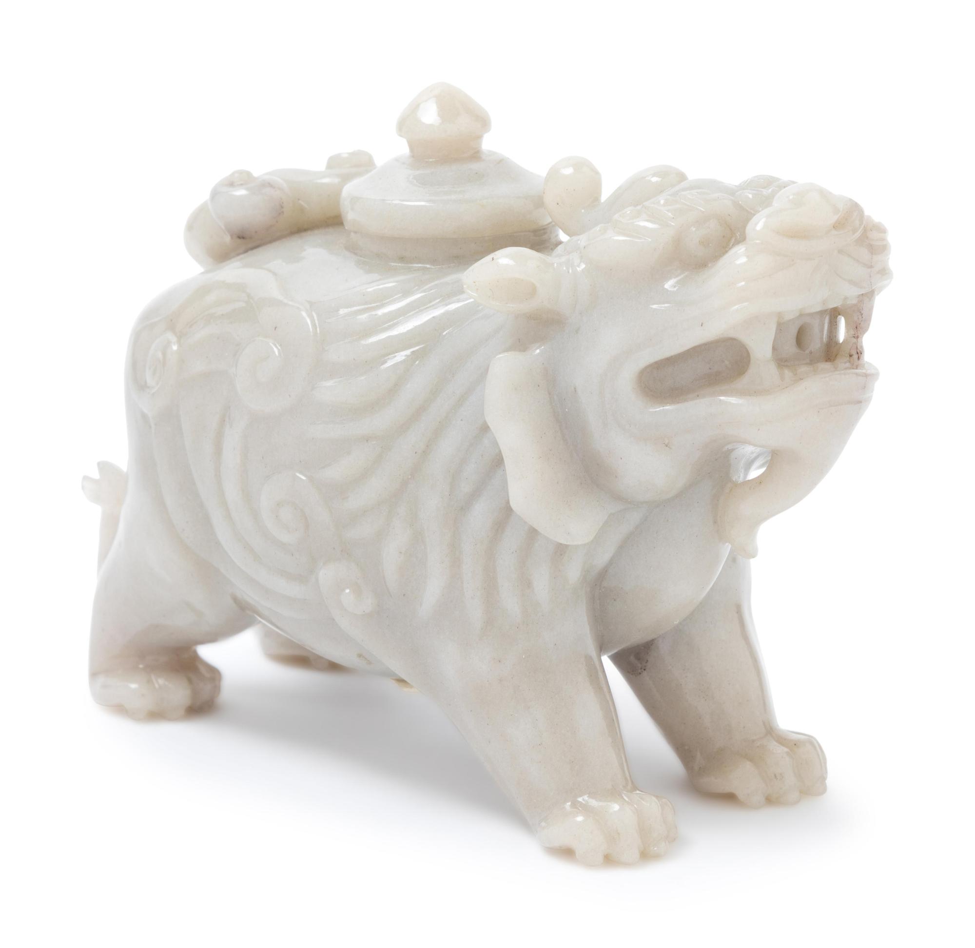 A Chinese Celadon Jadeite Beast-Form Water Dropper