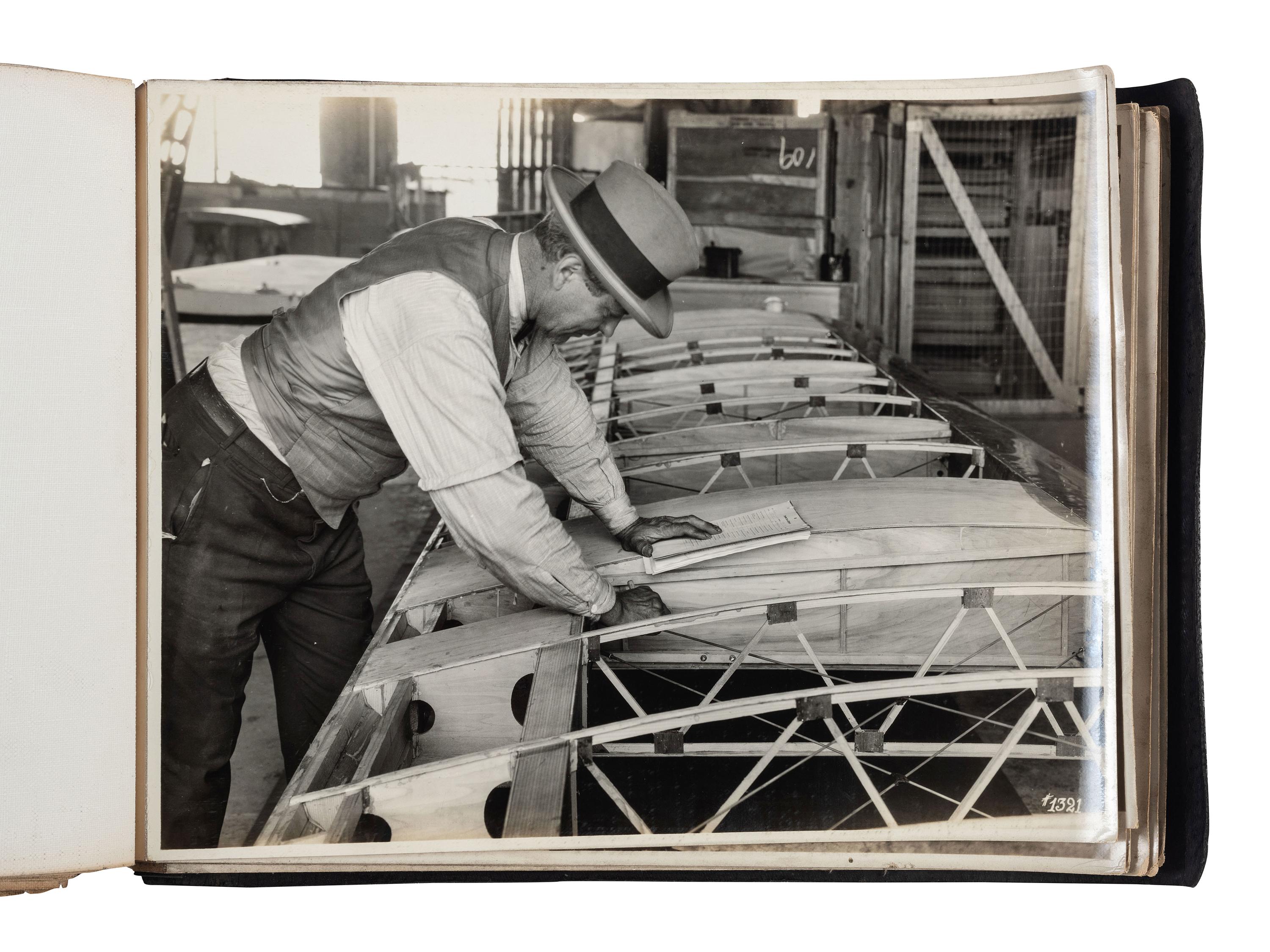 [AVIATION]. SMITH, Edgar B. (1896-1966), photographer. Rare photographic salesman aviation album documenting various airplanes and their construction at the plant of the Travel Air Manufacturing Company of Wichita, Kansas. Ca 1929.