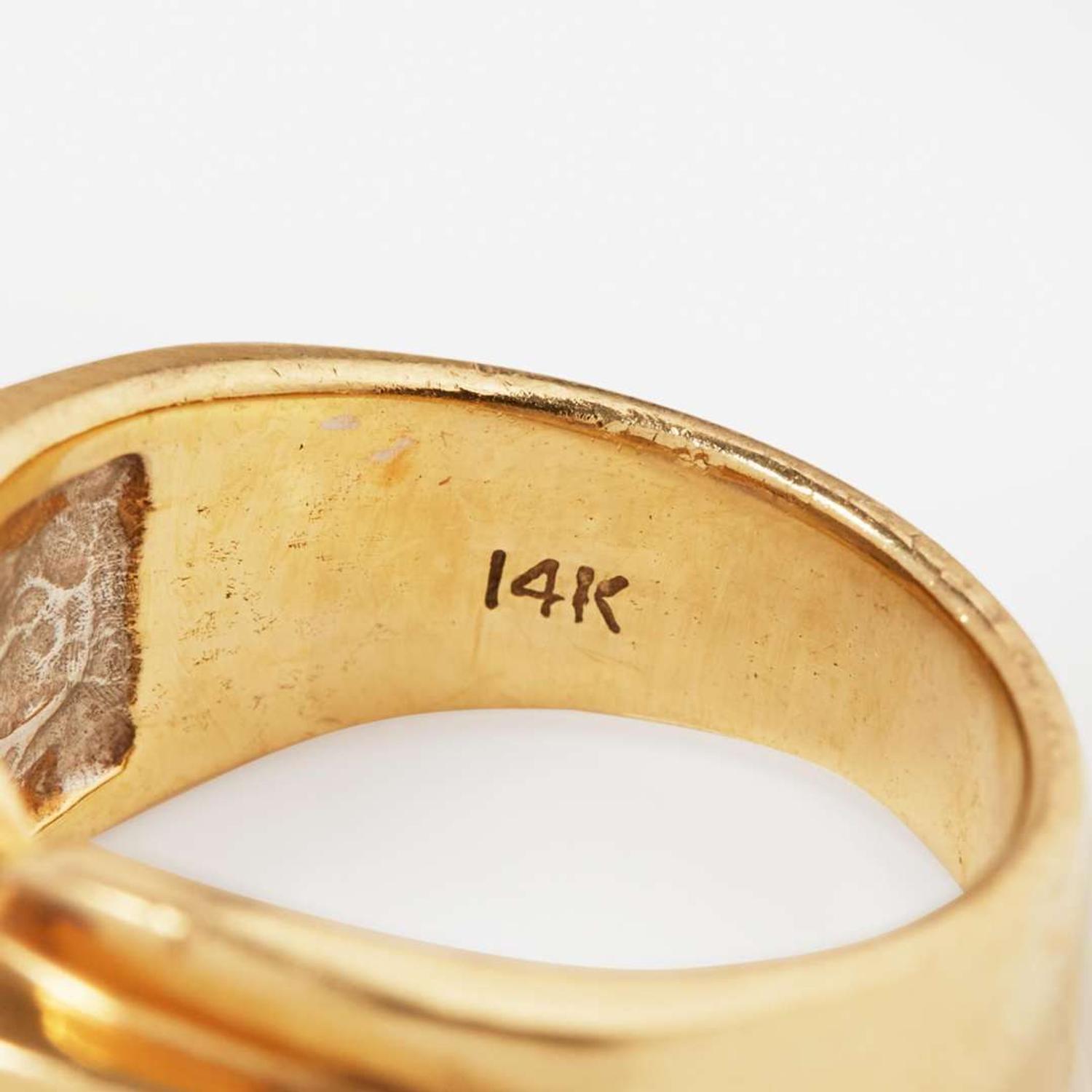 A 14K Yellow Gold, Tanzanite, and Diamond Ring