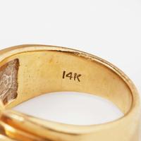 A 14K Yellow Gold, Tanzanite, and Diamond Ring