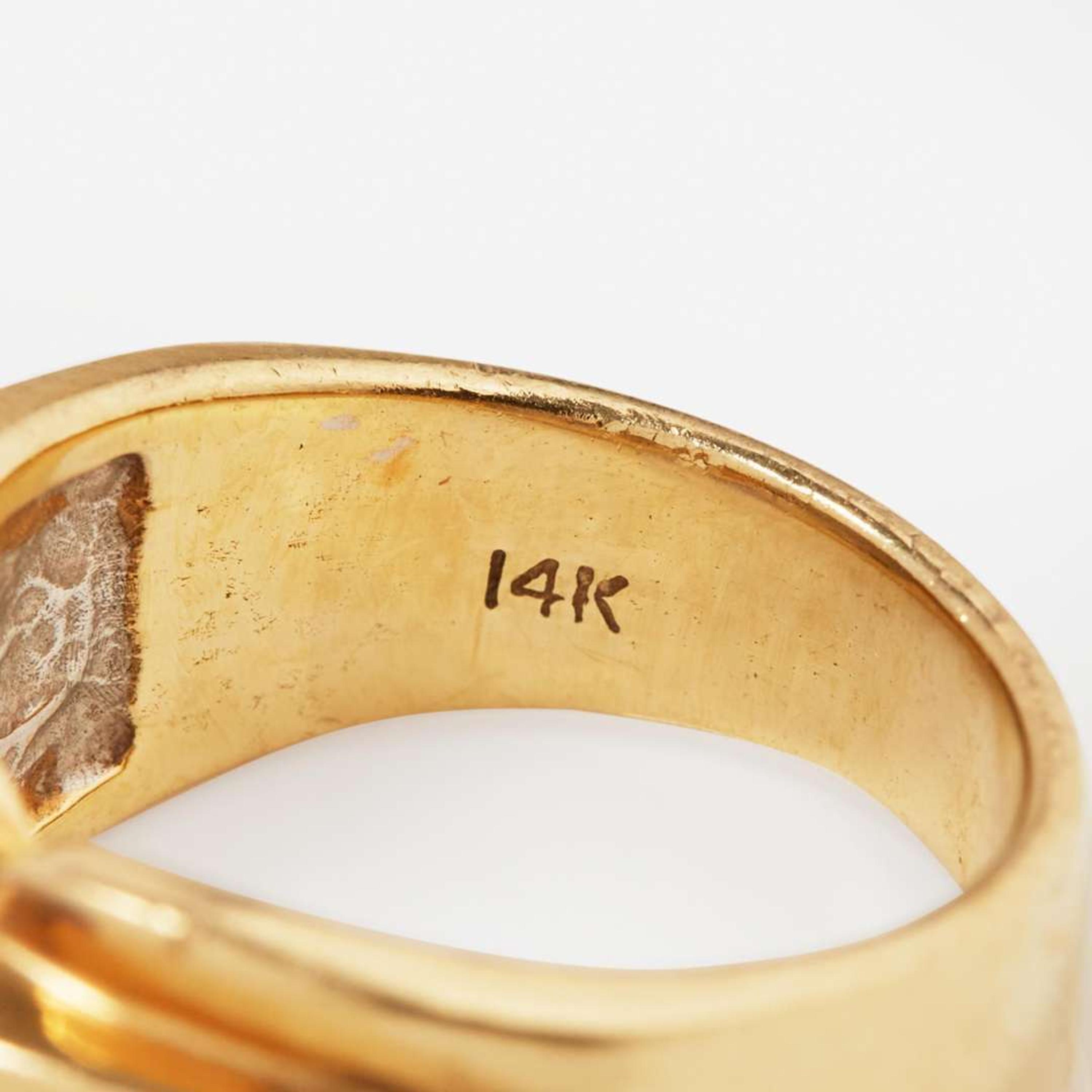 A 14K Yellow Gold, Tanzanite, and Diamond Ring
