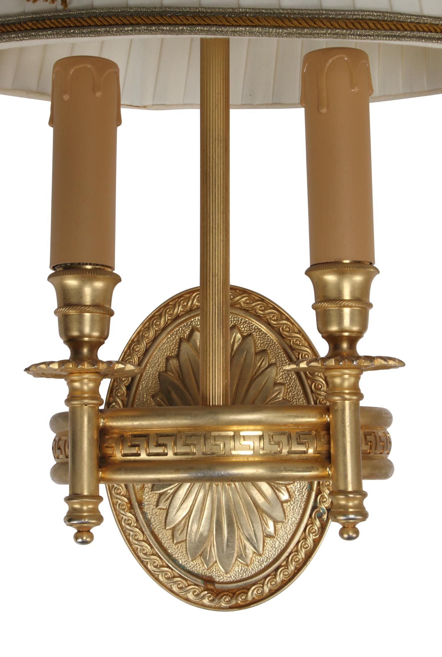 A Set of Eight Empire Style Gilt Bronze Two-Light Sconces