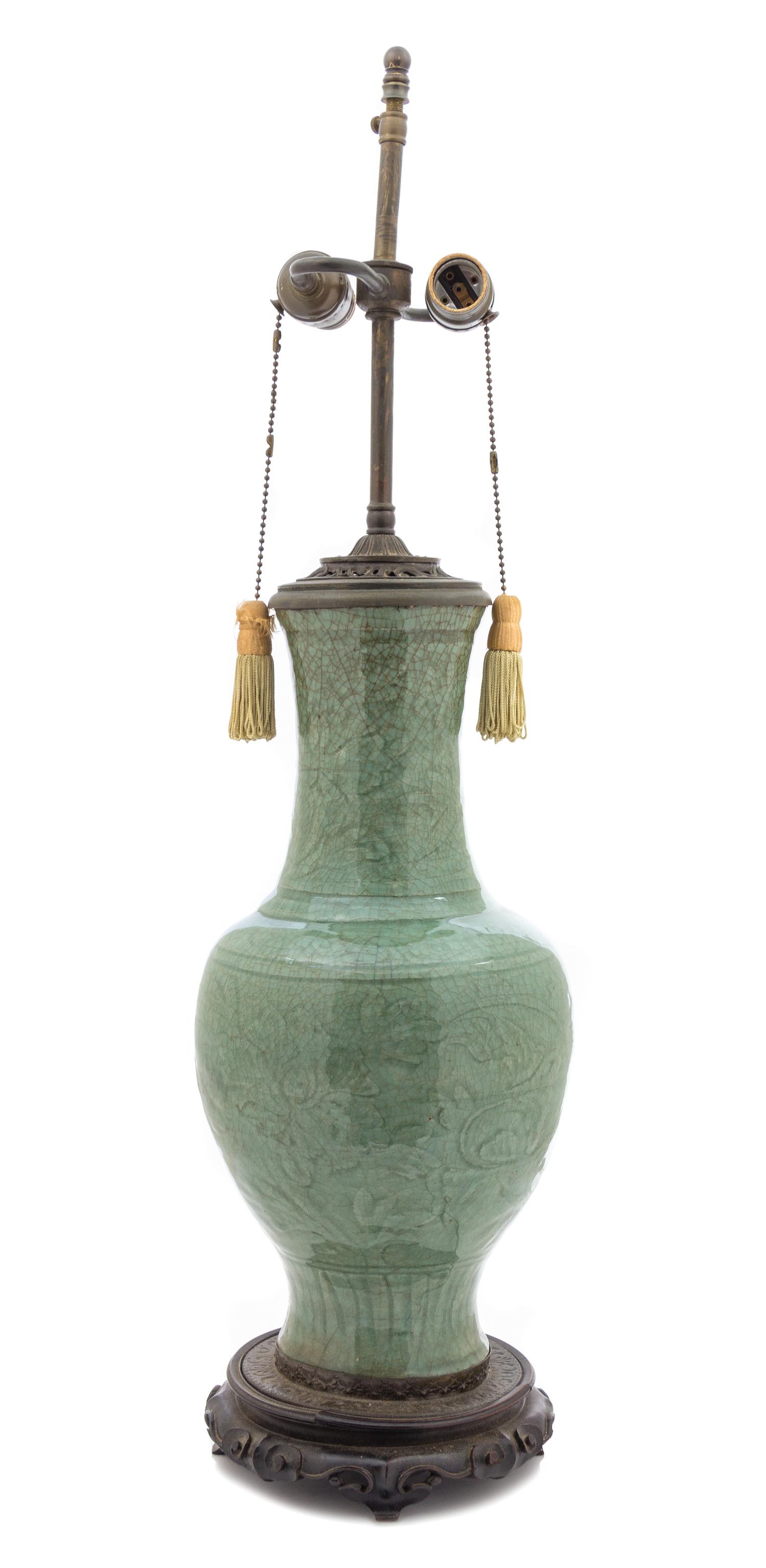 A Longquan Celadon Glazed Porcelain Baluster Vase MING DYNASTY, 15TH/16TH CENTURY — MING DYNASTY, 15TH/16TH CENTURY