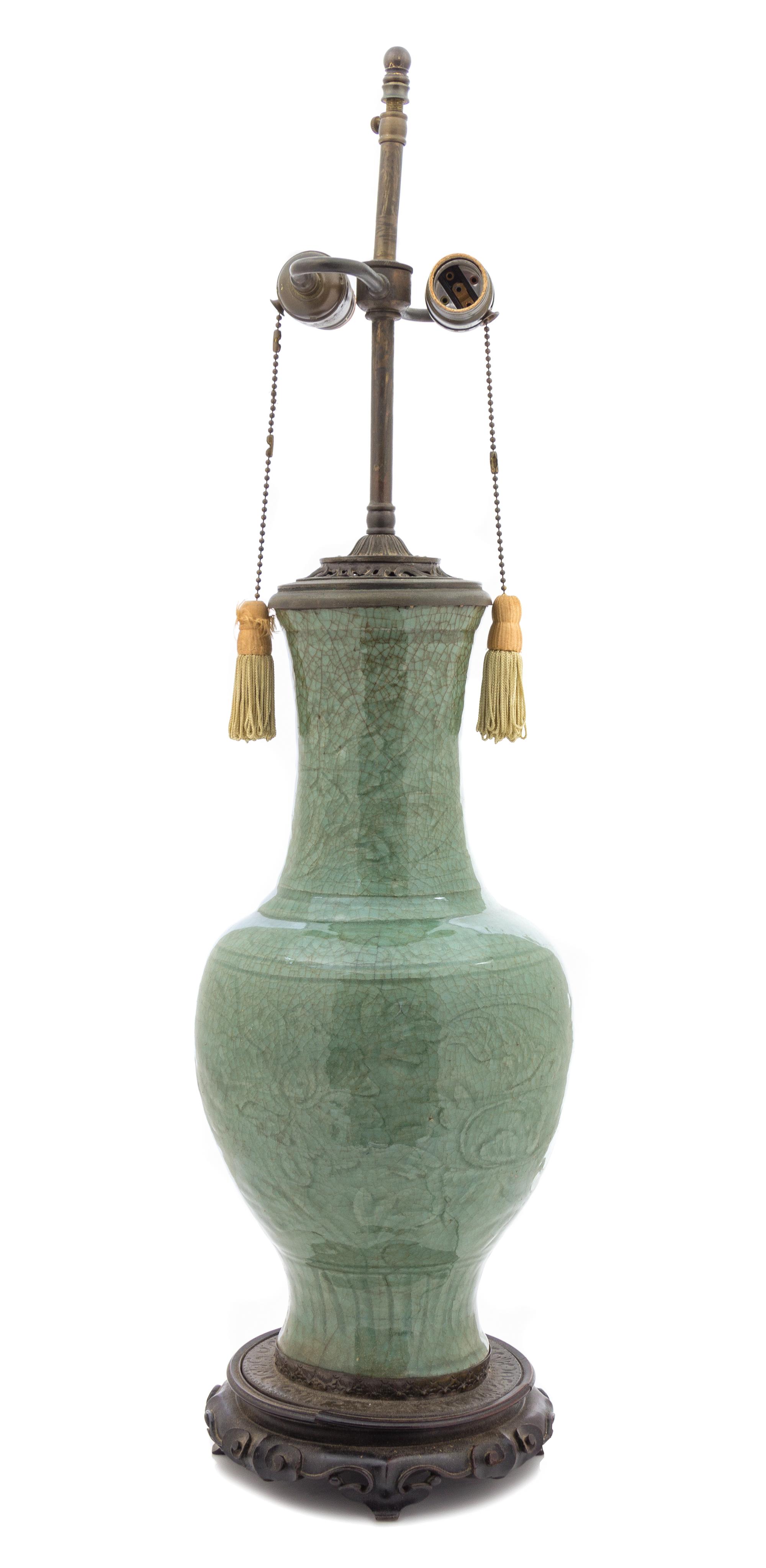 A Longquan Celadon Glazed Porcelain Baluster Vase MING DYNASTY, 15TH/16TH CENTURY — MING DYNASTY, 15TH/16TH CENTURY
