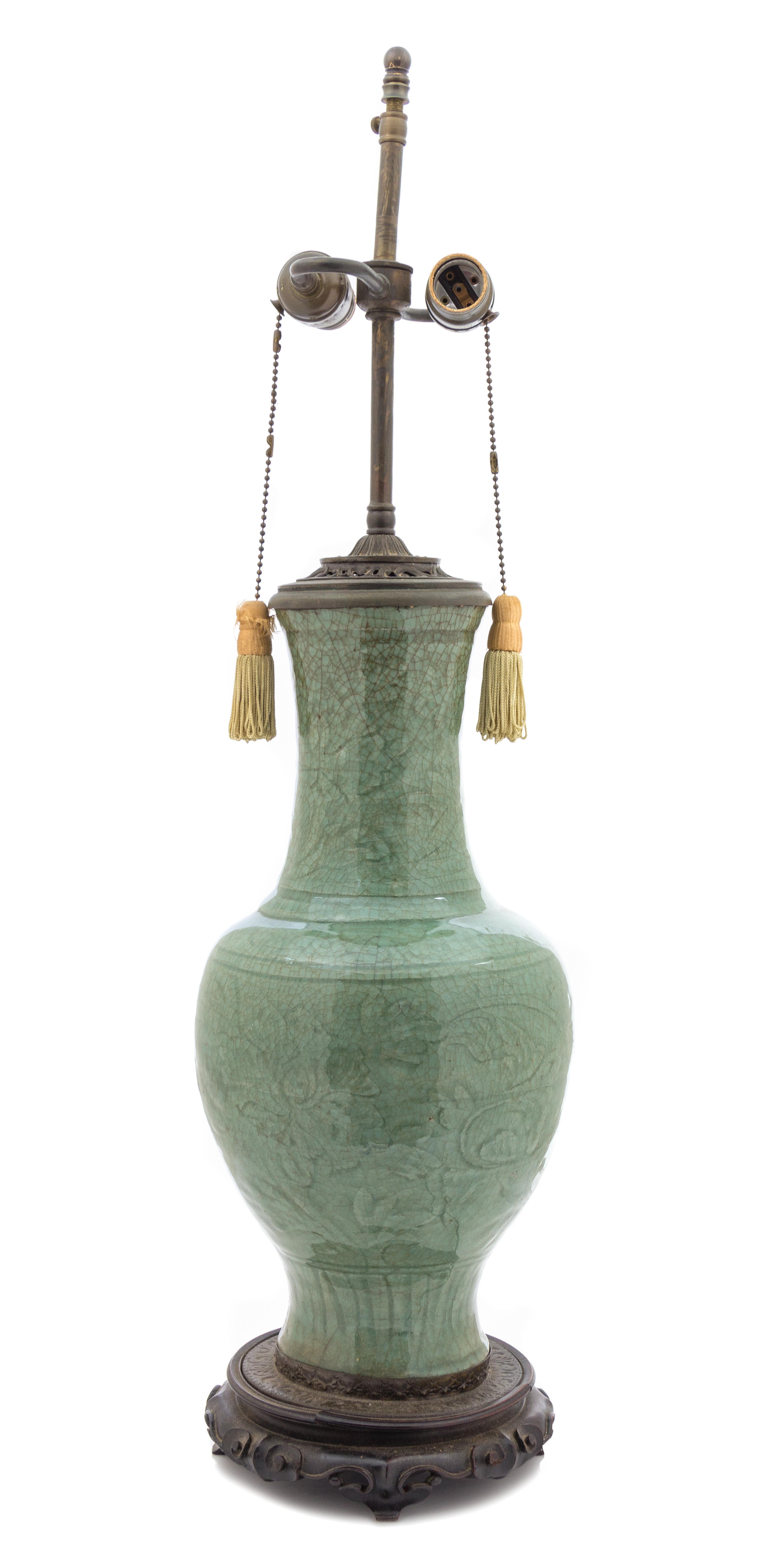 A Longquan Celadon Glazed Porcelain Baluster Vase MING DYNASTY, 15TH/16TH CENTURY — MING DYNASTY, 15TH/16TH CENTURY