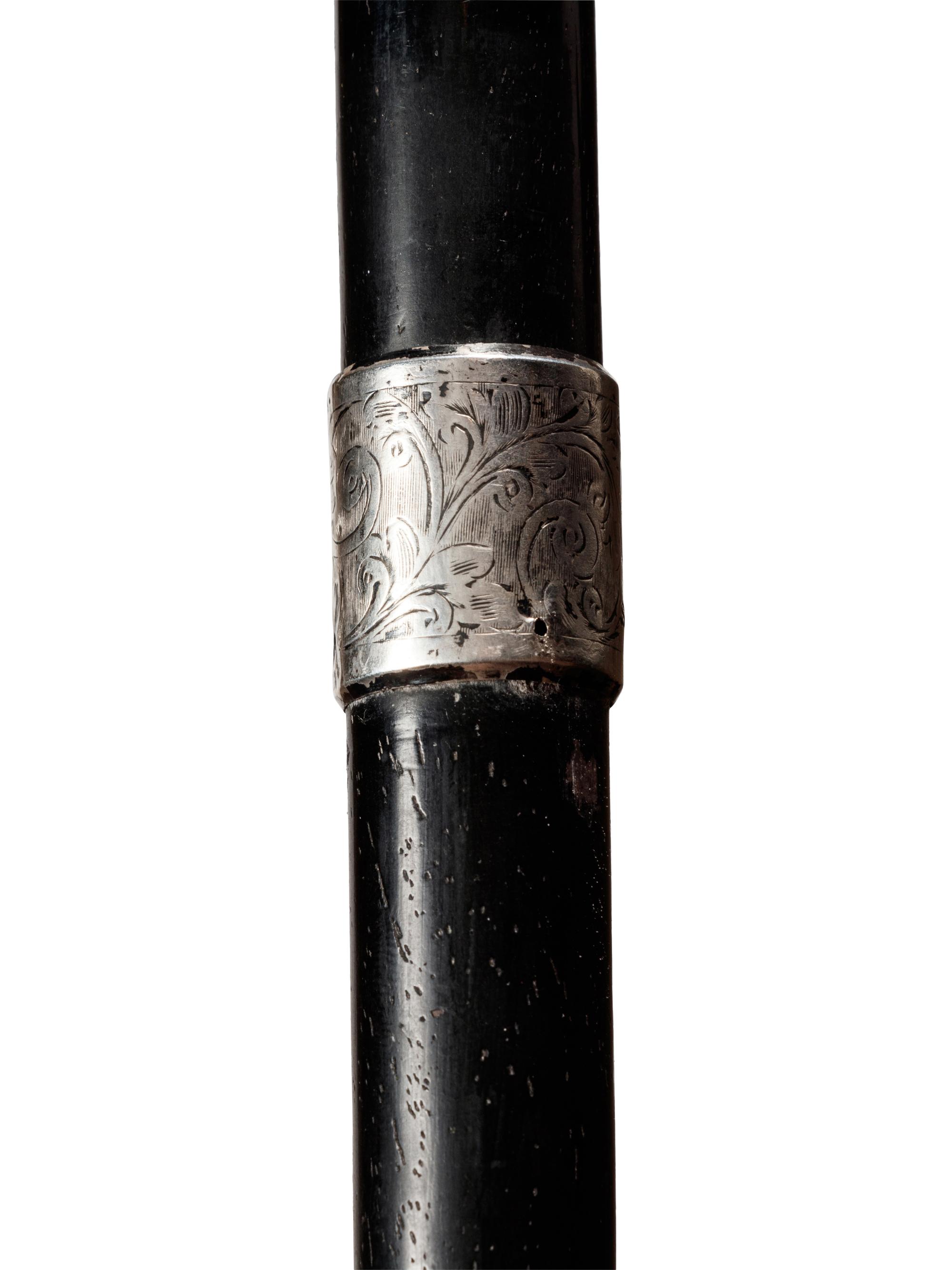 An English Silver Mounted Ebony Walking Stick
