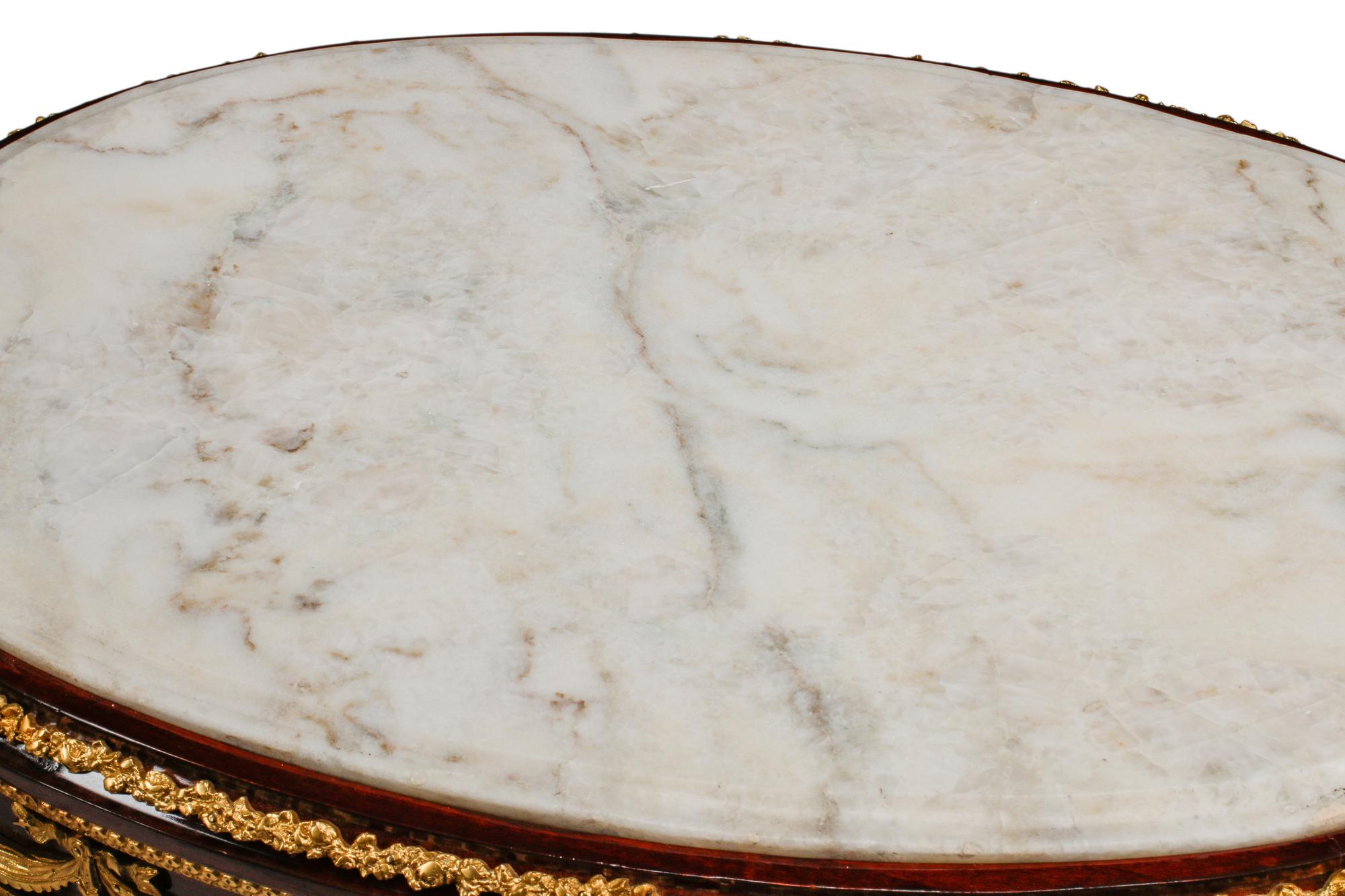 A Pair of Louis XVI Style Gilt Bronze Mounted Marble-Top Tables