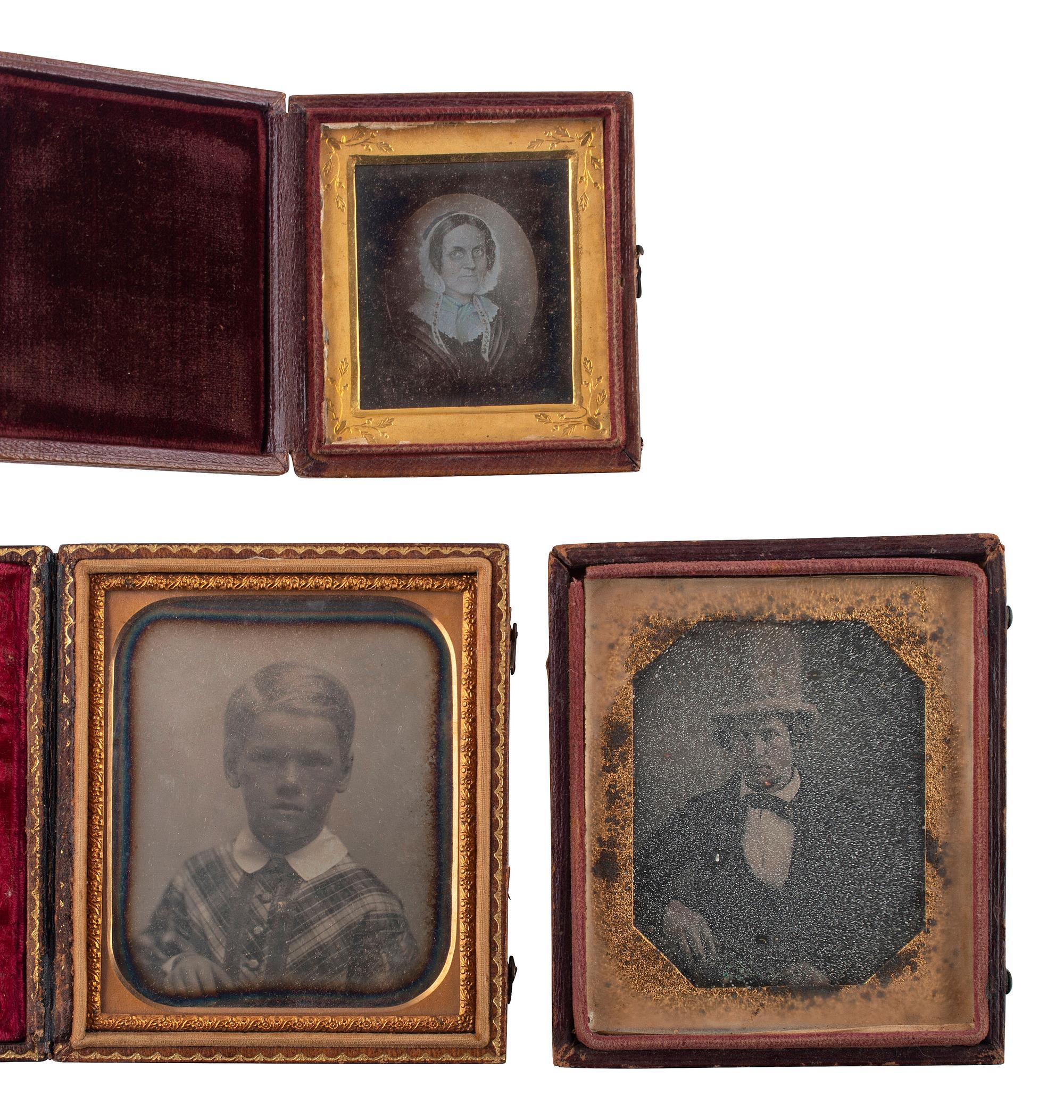 [EARLY PHOTOGRAPHY]. 23 cased images, incl. daguerreotype, ambrotype, and tintype portraits