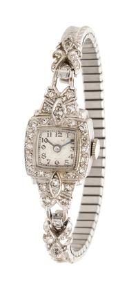 A Collection of Platinum, 14 Karat White Gold and Diamond Wristwatches,