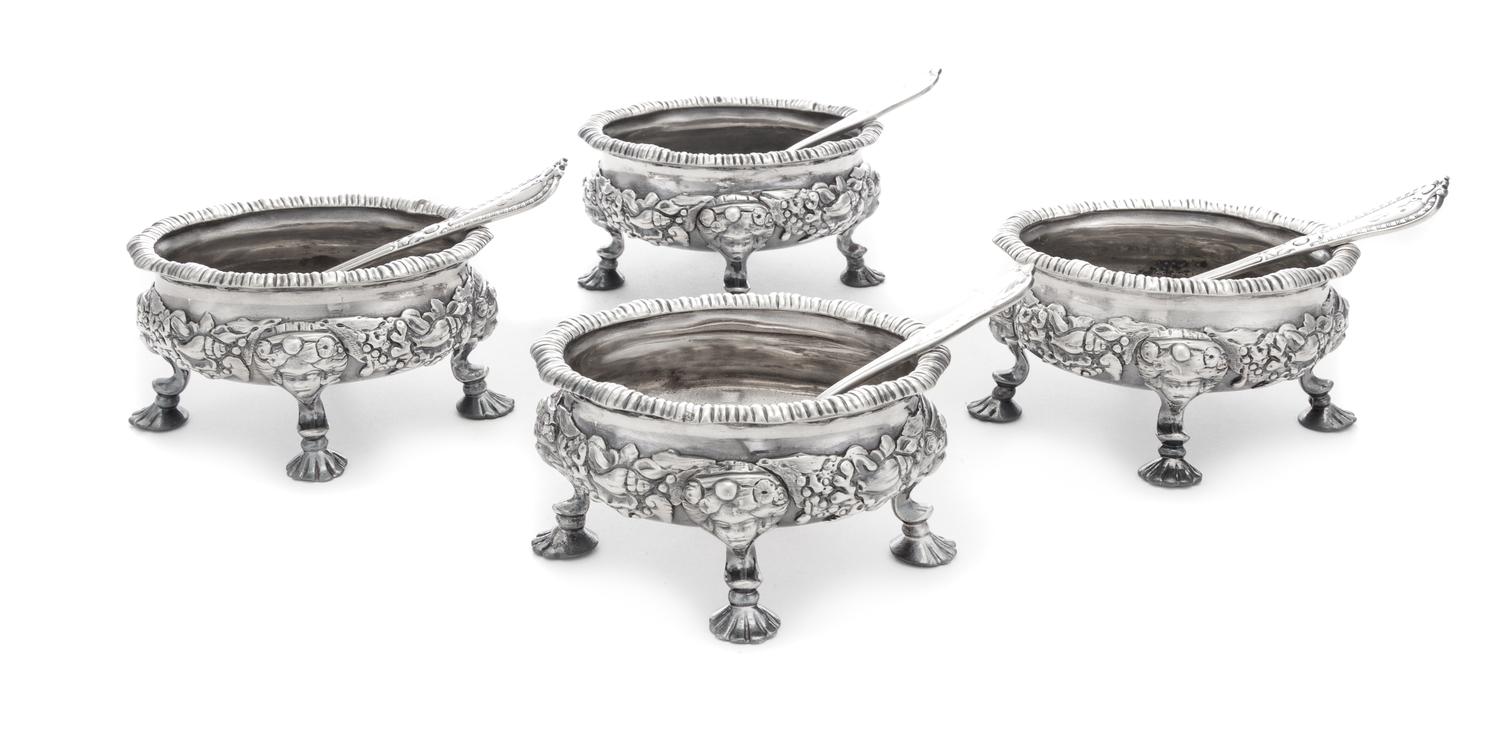 A Set of Four George II Silver Salt Cellars, David Hennell, London, 1750, each having an undulating gadroon rim, the bodies worked with