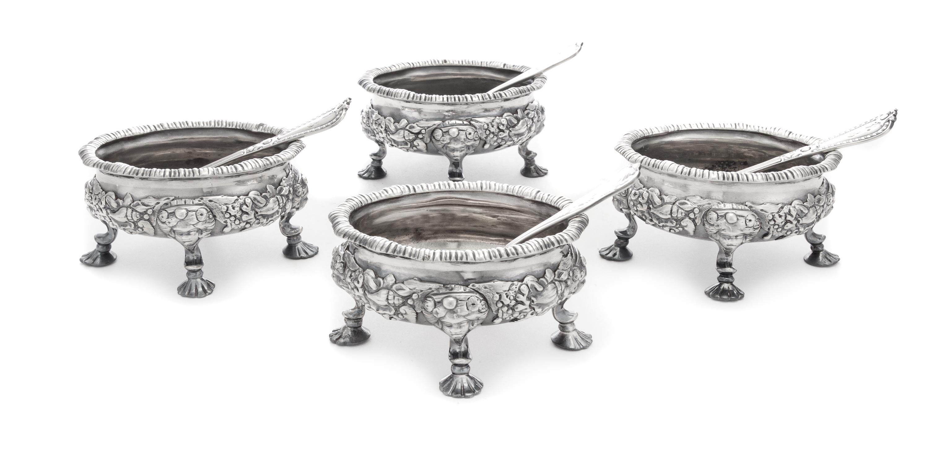 A Set of Four George II Silver Salt Cellars, David Hennell, London, 1750, each having an undulating gadroon rim, the bodies worked with