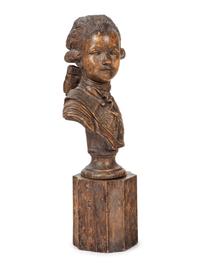 A French Carved Fruitwood Bust of a Young Louis XVI