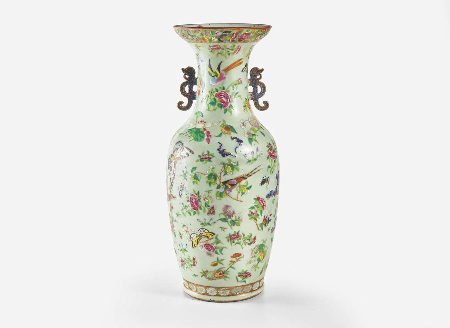 A Chinese famille-rose decorated molded celadon ground vase, 19th century 粉青地粉彩模印貫耳瓶 十九世紀