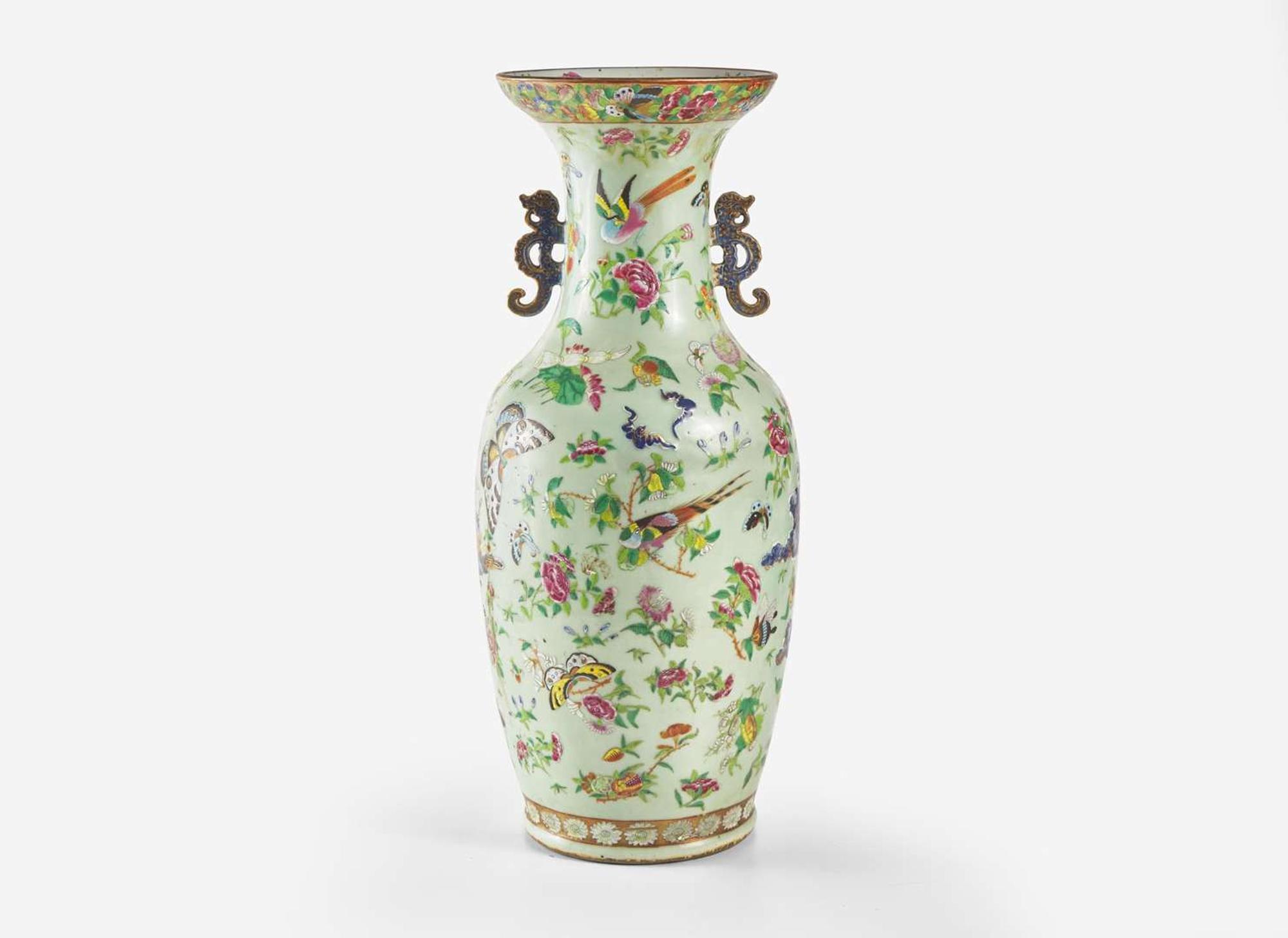 A Chinese famille-rose decorated molded celadon ground vase, 19th century 粉青地粉彩模印貫耳瓶 十九世紀