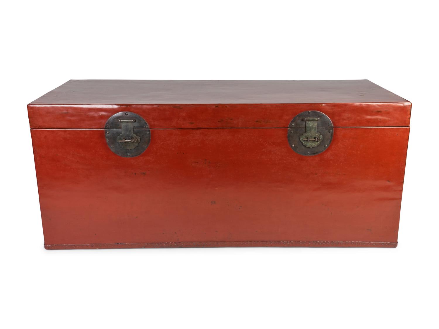 A Large Chinese Red-Lacquered Leather Trunk