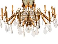 An Italian Painted Iron and Tôle Twelve-Light Chandelier