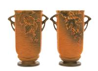 A Pair of Roseville Bushberry Pottery Vases Height 9 1/4 inches.