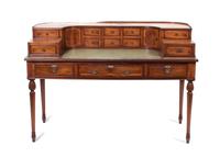 A Yew Wood Carlton House Desk Height 37 1/2 x width 54 1/2 x depth 27 1/2 inches. — CIRCA 1870