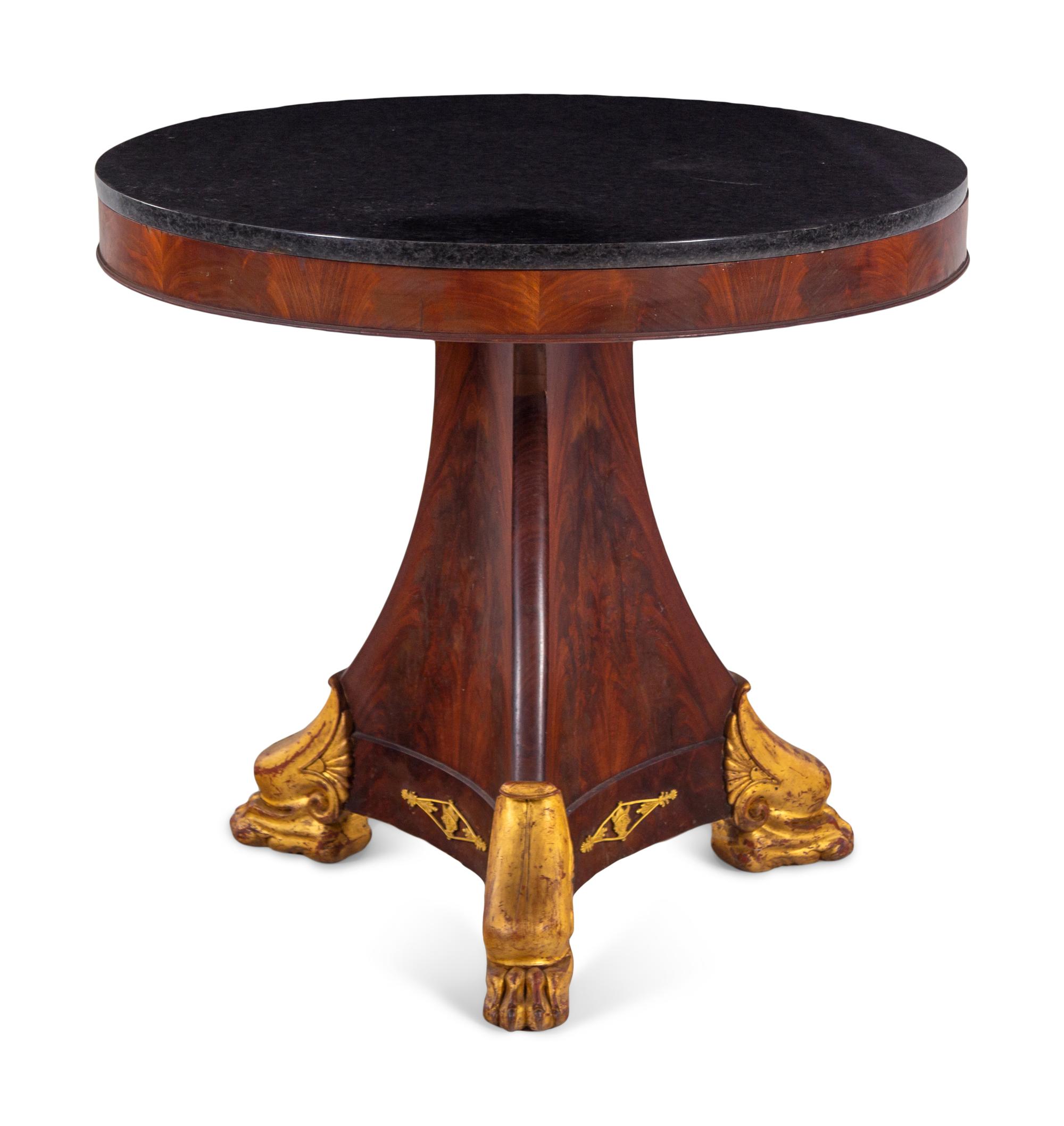 An Empire Style Parcel Gilt Mahogany Marble-Top Center Table