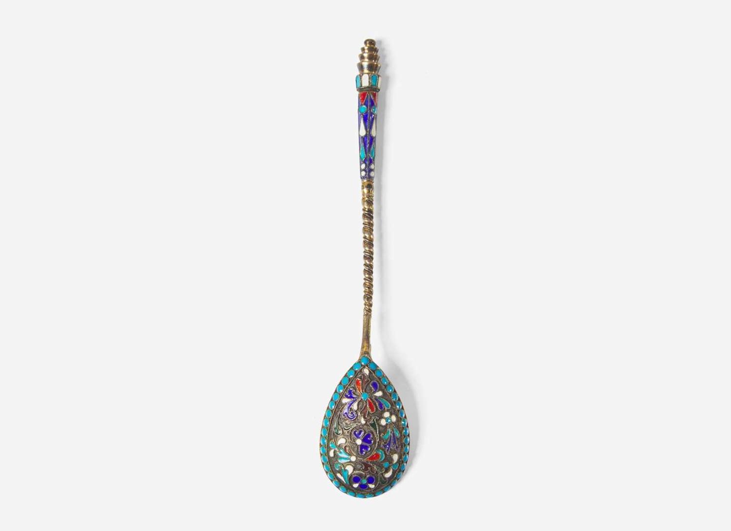 A cased set of six Russian silver gilt and shaded enamel spoons, maker's mark indistinct, Assay master Anatoly Apollonovich Artsybashev, Moscow, 1894