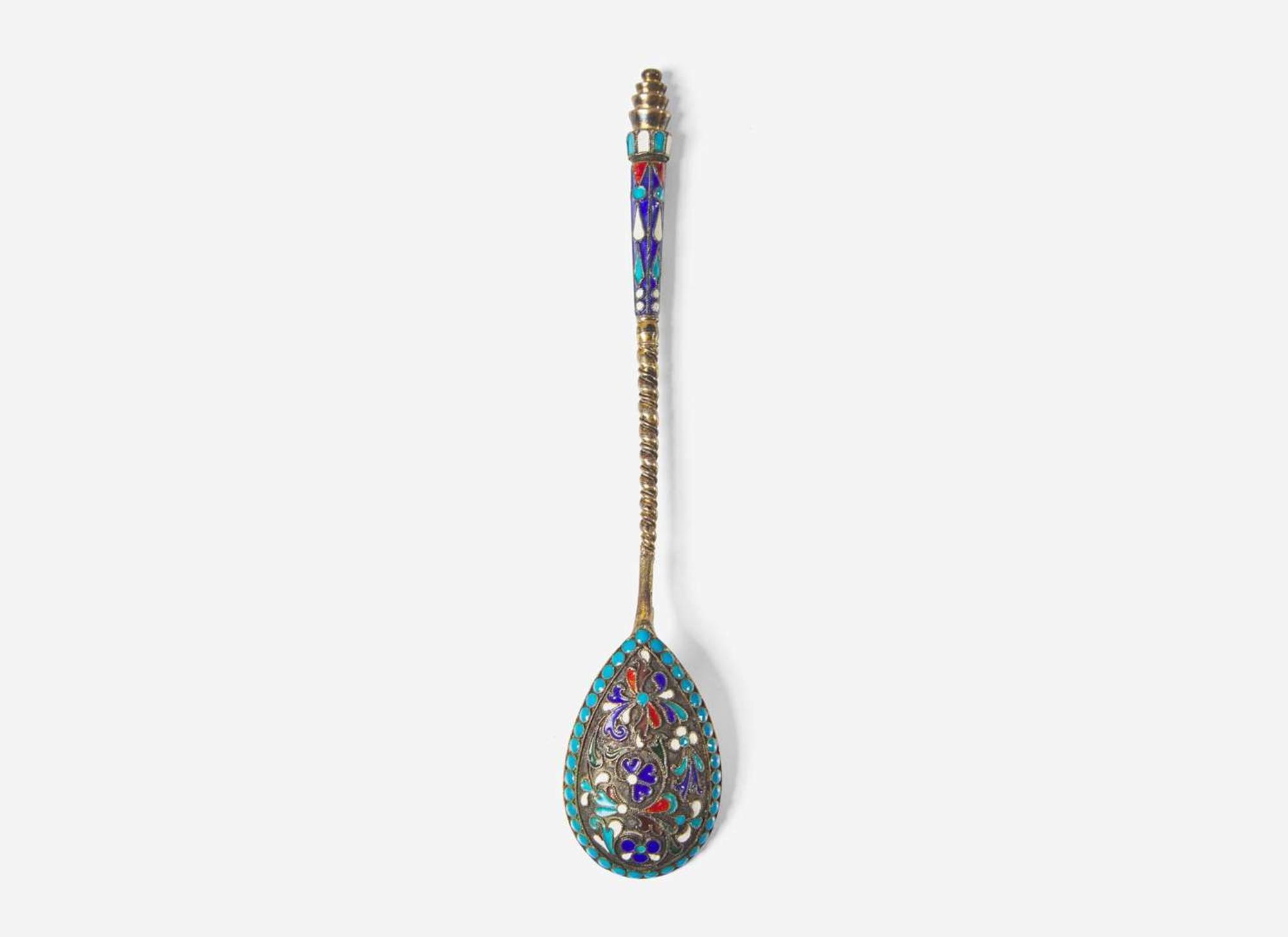 A cased set of six Russian silver gilt and shaded enamel spoons, maker's mark indistinct, Assay master Anatoly Apollonovich Artsybashev, Moscow, 1894