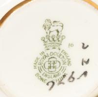 Five Porcelain Cups and Saucers