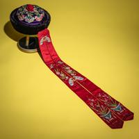 An Embroidered Silk Manchu Noblewoman's Winter Hat, Kunqiumao , 19th Century — 清晚期 紫頂蓋花鑲珠后妃坤秋帽