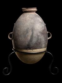 A Chancay Bichrome Vessel with Monkey Figure
