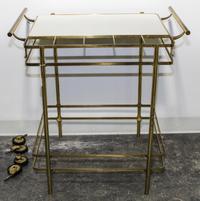An Italian Brass and Glass Bar Cart. Height 34 inches.