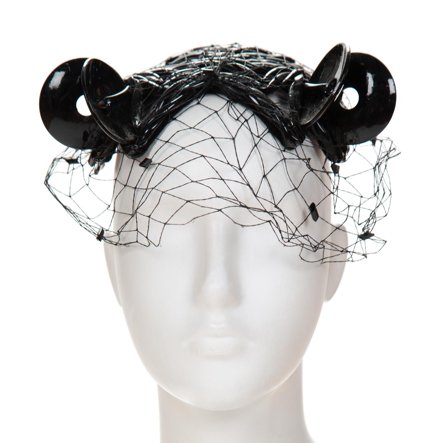 A Bes-Ben Rare Black Plastic Tubed Hat, 6" x 6".