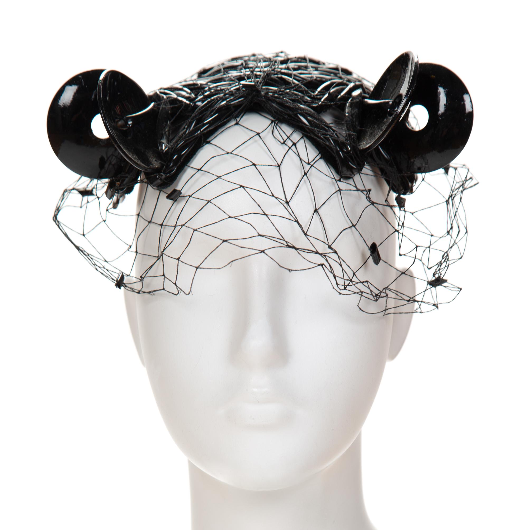 A Bes-Ben Rare Black Plastic Tubed Hat, 6" x 6".