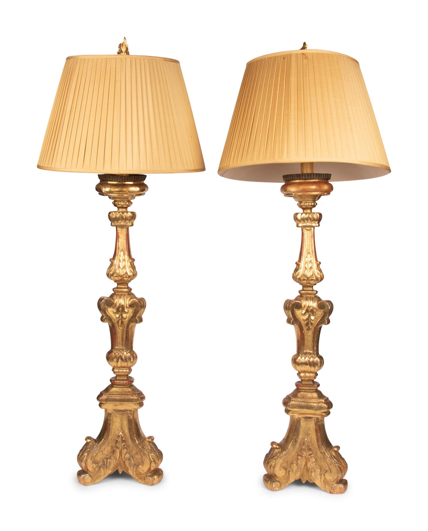 A Pair of Italian Giltwood Prickets Mounted as Lamps