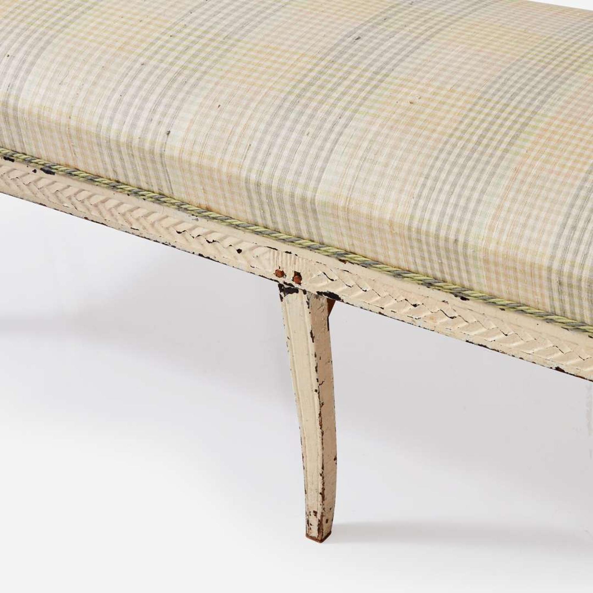 A Northern European cream-painted carved wood settee late 19th / early 20th century