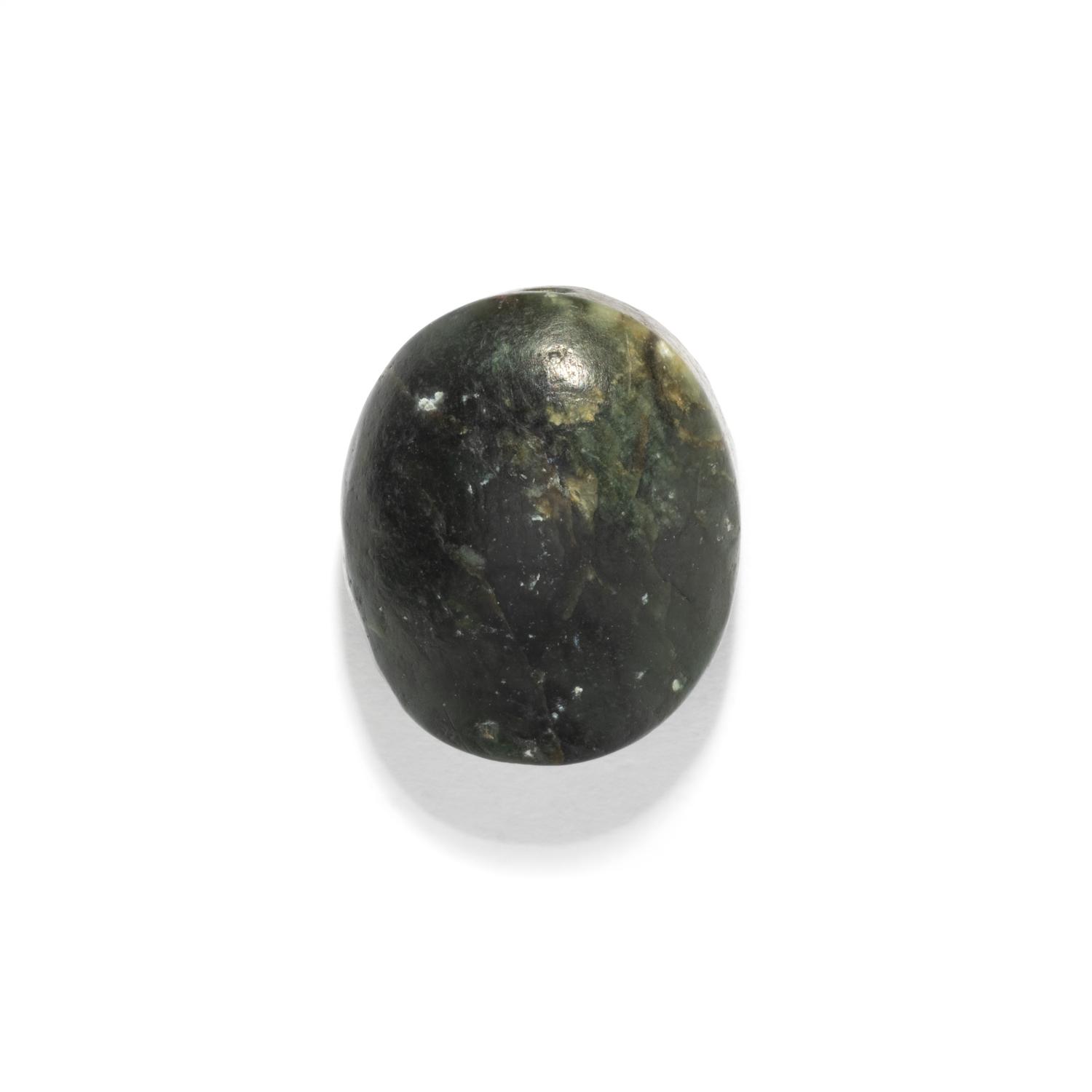 A Greco-Persian Onyx Scaraboid with a Griffin and Winged Sun Disc